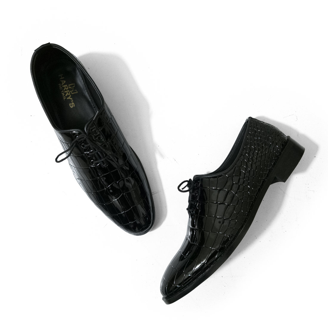 SHINNY TEXTURED BLACK SLIP-ONS