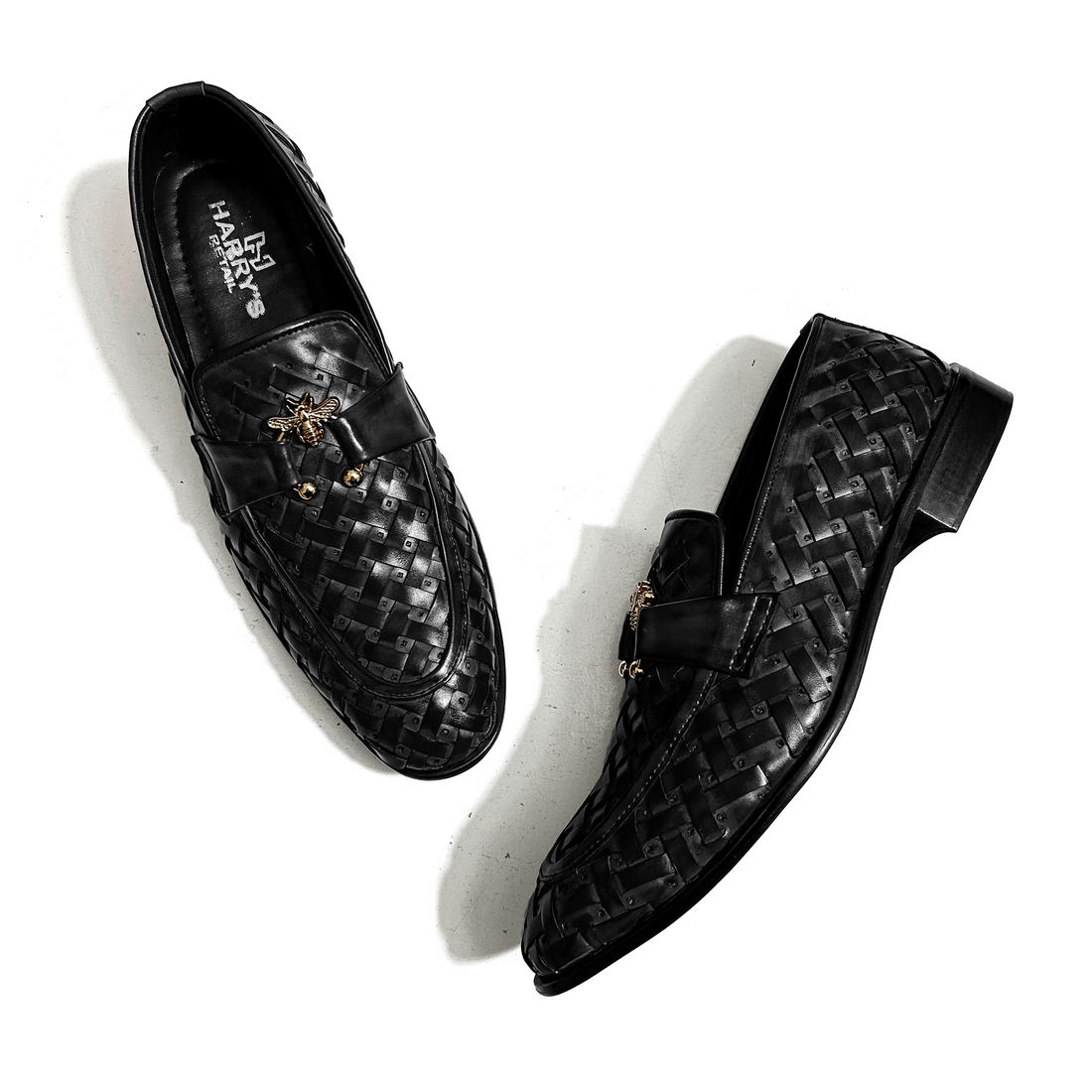 BLACK BRAIDED SLIP-ONS