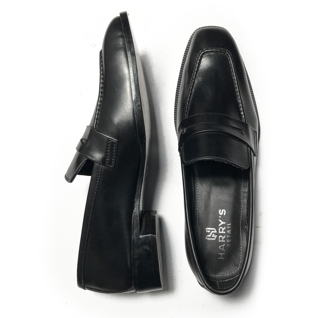 BASIC BLACK SLIP-ONS